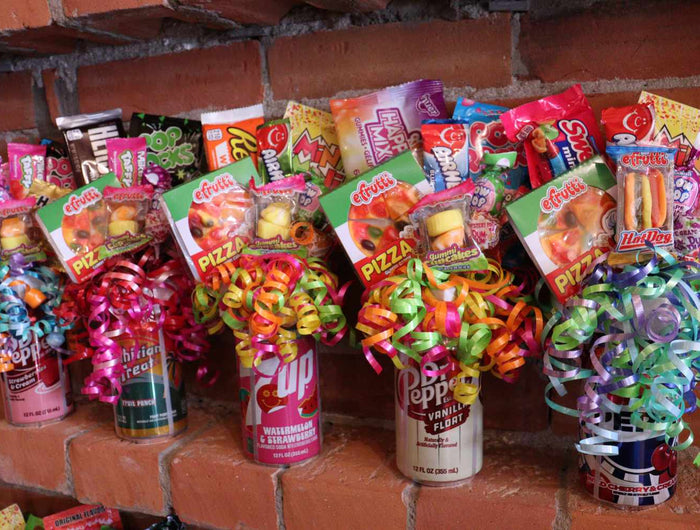 <h5><span style="text-decoration:underline"><strong>The gift that's pretty... and pretty tasty!</strong></span></h5><h2><strong>Make your Event Pop!</strong></h2><p><strong>Popcan bouquets made to order or grab off the shelf</strong></p>